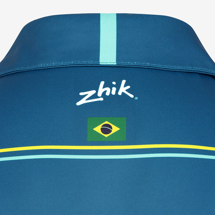 Close-up of the Mubadala Brazil SailGP Team Polo Shirt with the Zhik logo and Brazilian flag.